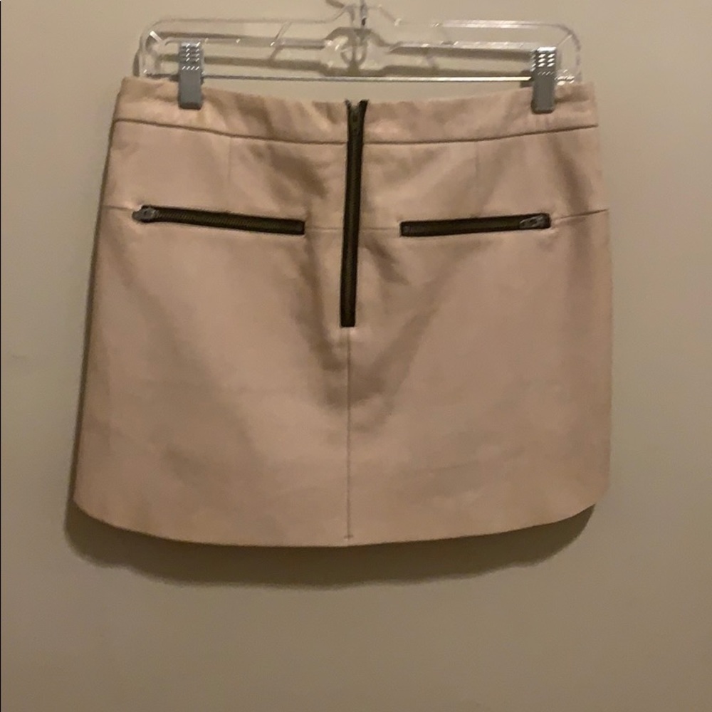 Pink leather mini skirt